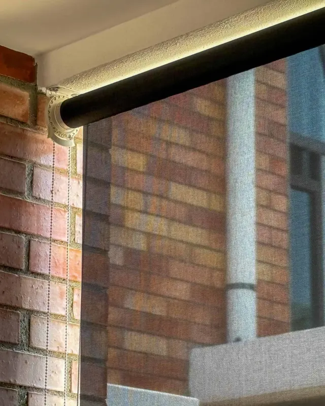 Outdoor roller blind on a patio