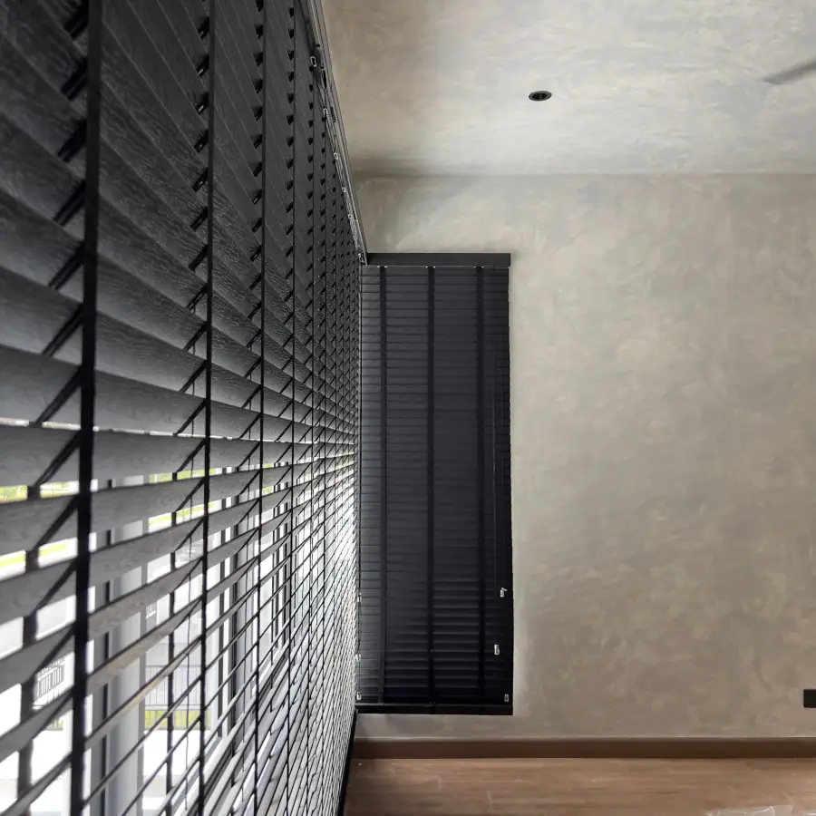 Black timber blinds in a modern room